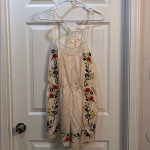 EUC Anthro cream and embroidered romper